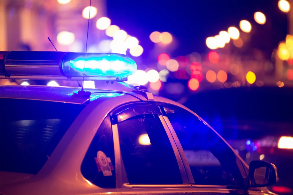 Squad car with lights flashing